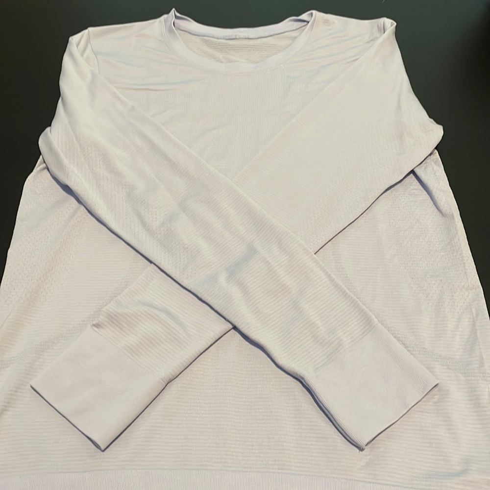 Light blue swiftly tech LuLulemon long sleeve. Relaxed fit!